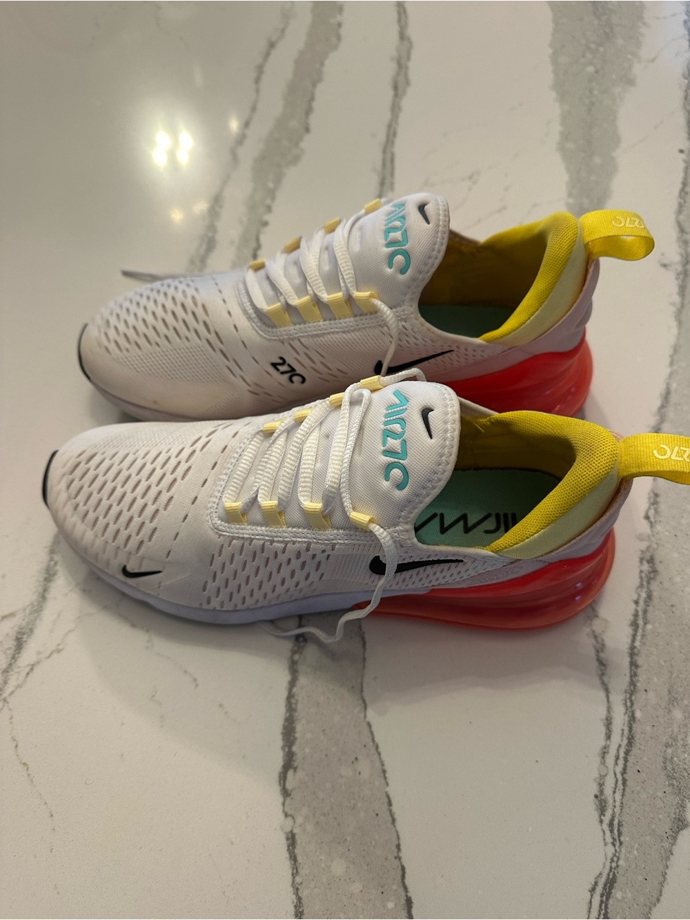 Nike Women's White Sneakers with Yellow Lining and Pink Heel Cushion